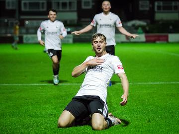 Lucas Weaver celebrates after scoring against Prescot Cables