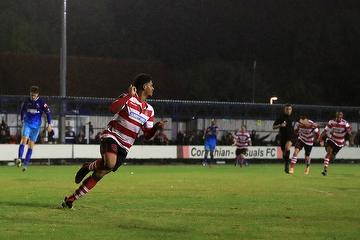 Corie Andrews wheels away after scoring a last minute winner - photo by Simon Roe