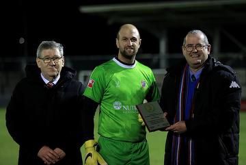 Rob Tolfrey receives a special award from the Isthmian League marking his 600th appearance for the K's, presented to him by chairman Nick Robinson (right) with Kingstonian chairman John Fenwick (left)