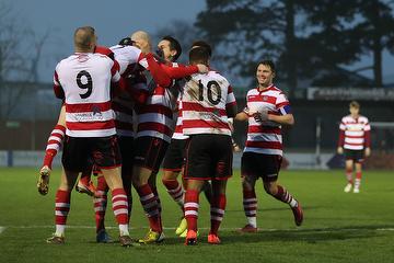 Sean Clohessy celebrates with team mates after scoring Kingstonian's second goal at Bishop's Stortford