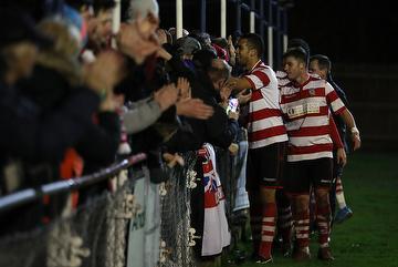 Victorious K's high fiving the crowd after 3-1 win at home to Woking